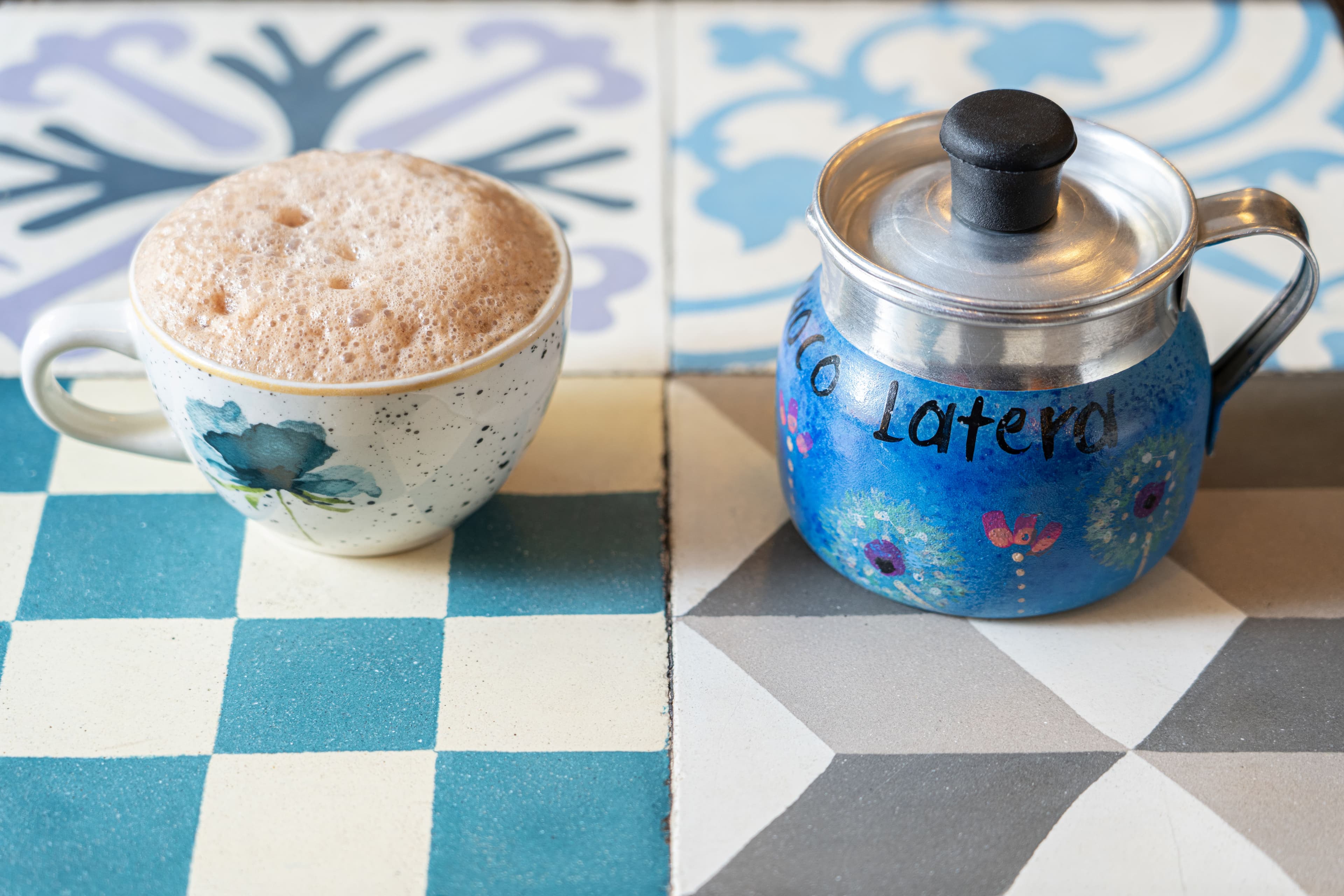 Close-up of a steaming cup of Colombian hot chocolate with spices